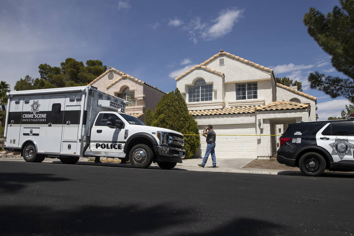 The Las Vegas Metropolitan Police Department investigate the discovery of human remains at a ho ...