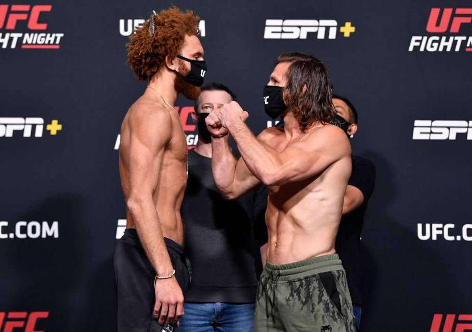 LAS VEGAS, NEVADA - APRIL 16: (L-R) Opponents Luis Pena and Alexander Munoz face off during the ...