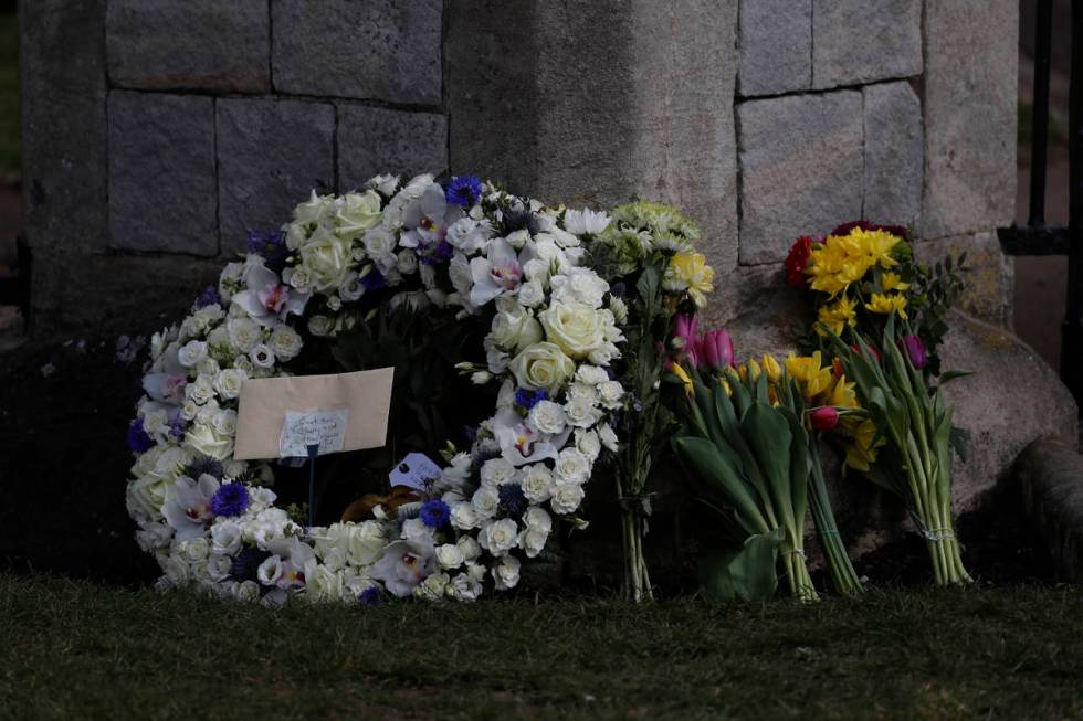 A wreath laid by Andre and Stan Walker for Prince Philip outside Windsor Castle in Windsor, Eng ...