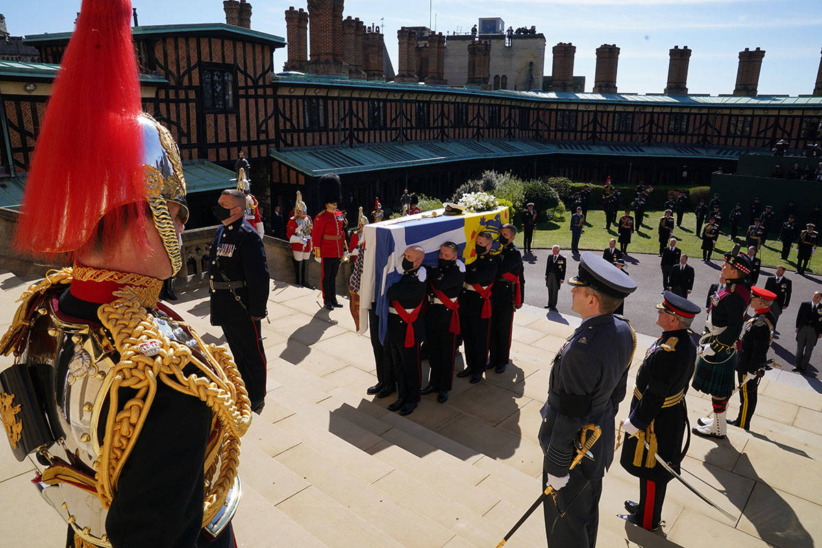 The coffin is held on the steps of St George's Chapel during the procession of Britain Prince P ...