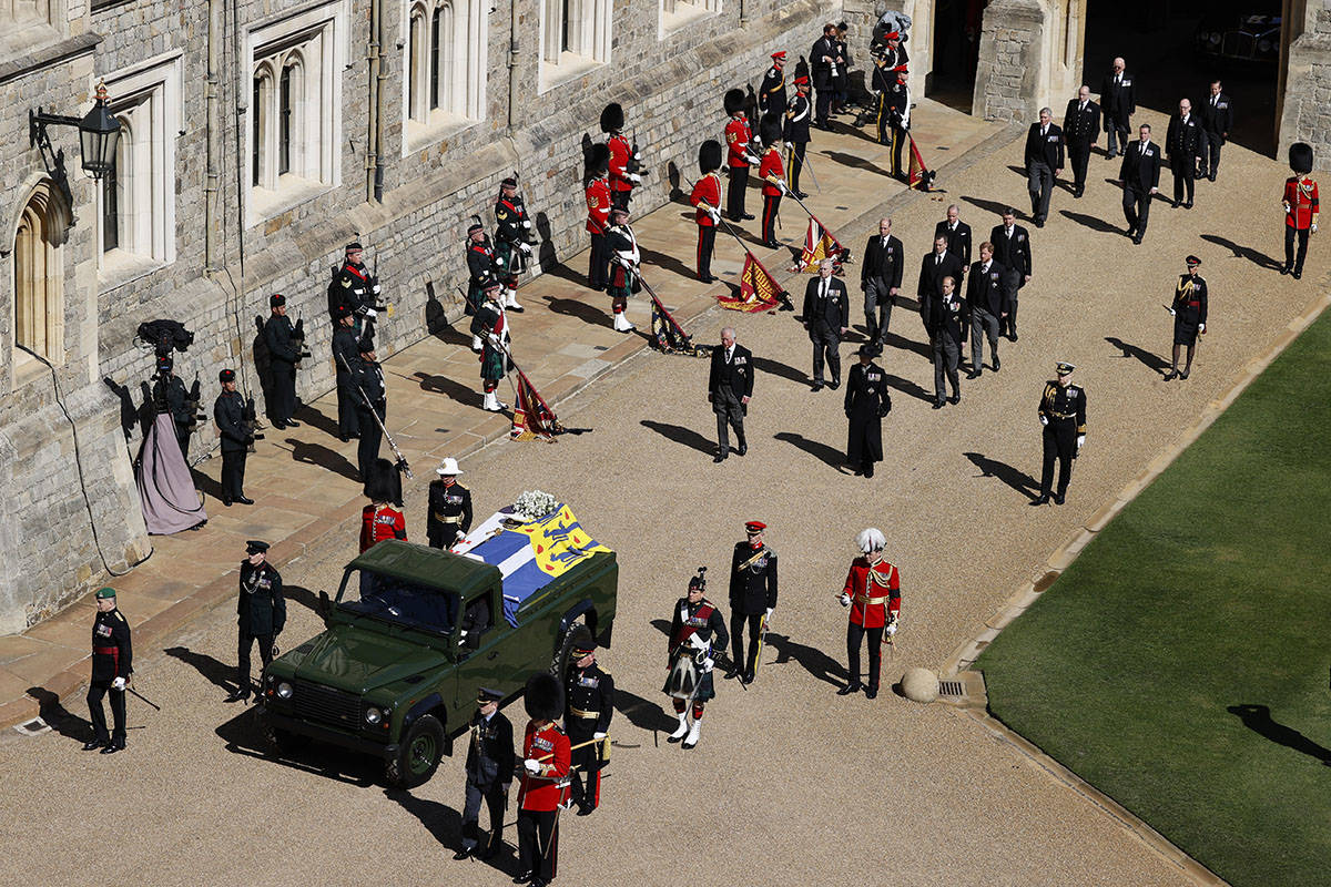 Members of the Royal family follow the coffin of Britain's Prince Philip in the Quadrangle at W ...