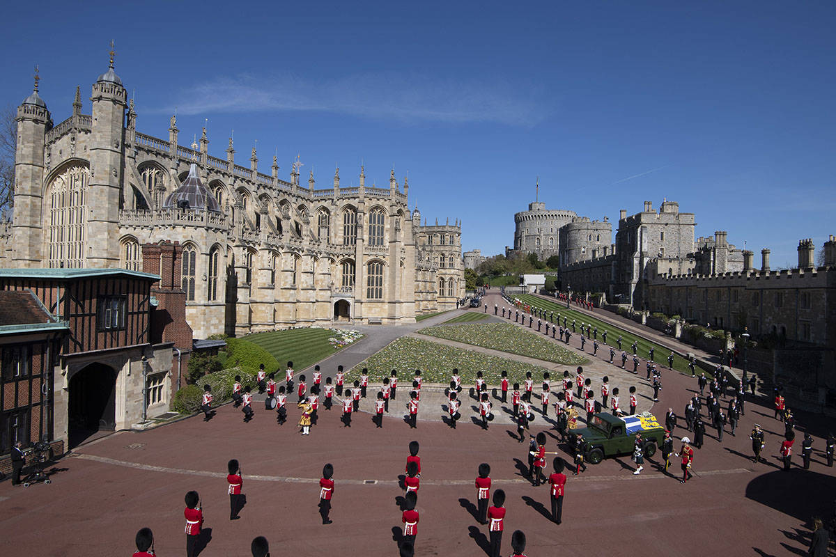 Family members follow the coffin during a procession arriving at St George's Chapel for the fun ...