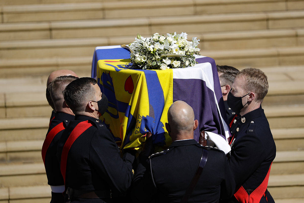 The coffin arrives at St George's Chapel for the funeral of Britain's Prince Philip inside Wind ...