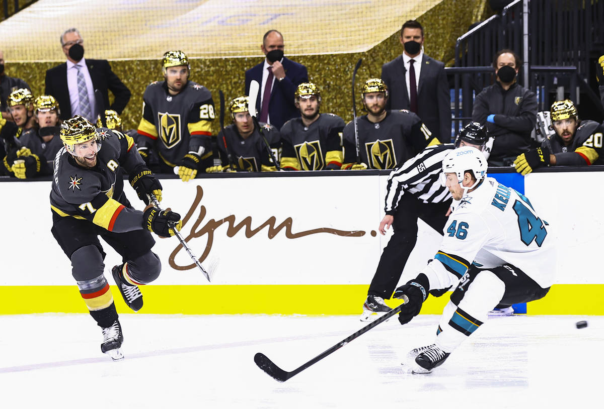 Golden Knights' Alex Pietrangelo (7) shoots past San Jose Sharks' Joel Kellman (46) during the ...