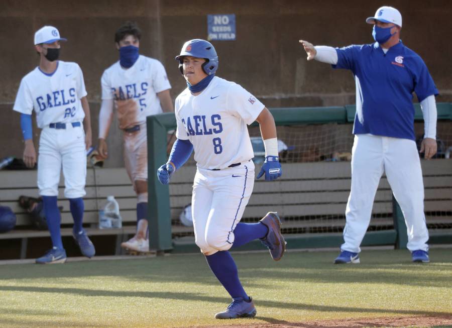 Bishop Gorman's Gunnar Myro (8) runs home for a run against Coronado in the fifth inning of the ...