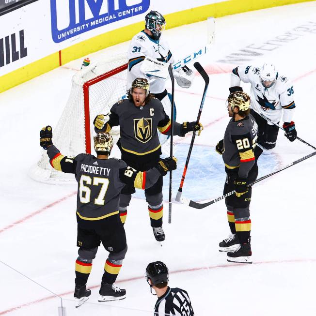 Golden Knights' Mark Stone (61) celebrates with teammates after scoring against San Jose Sharks ...