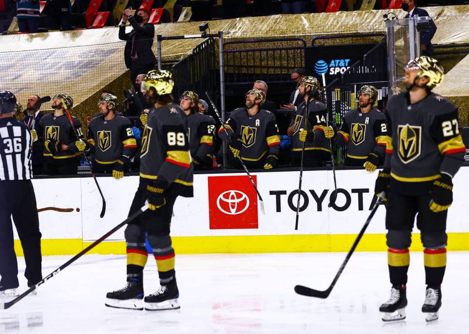 The Golden Knights tap their sticks as San Jose Sharks' Patrick Marleau, not pictured, is honor ...