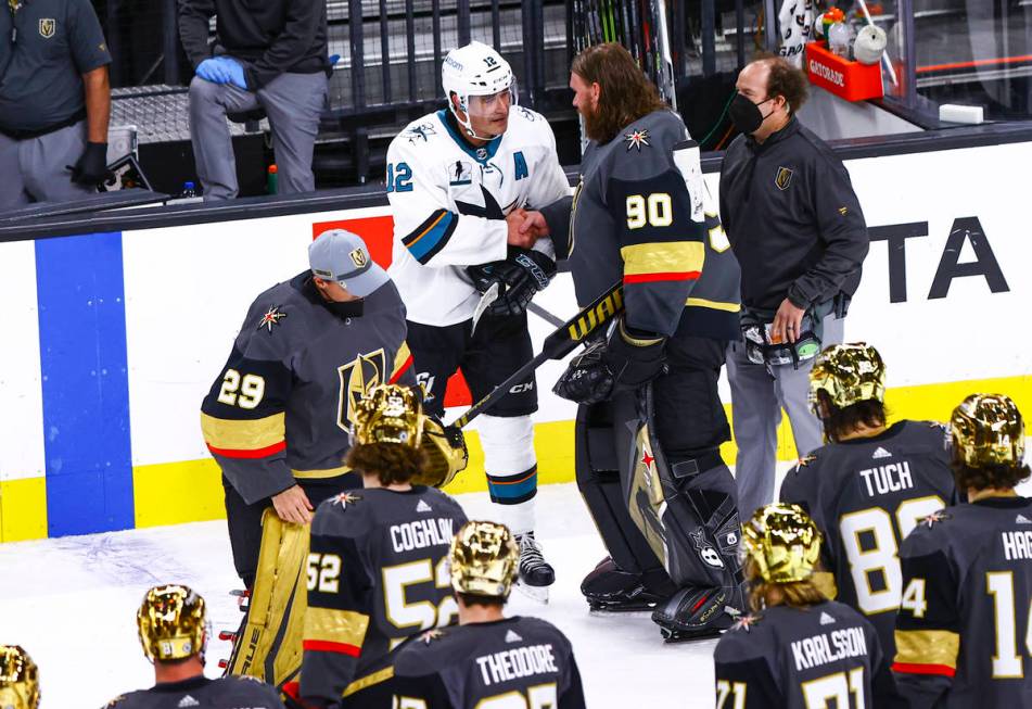 San Jose Sharks' Patrick Marleau (12) shakes hands with Golden Knights goaltender Robin Lehner ...