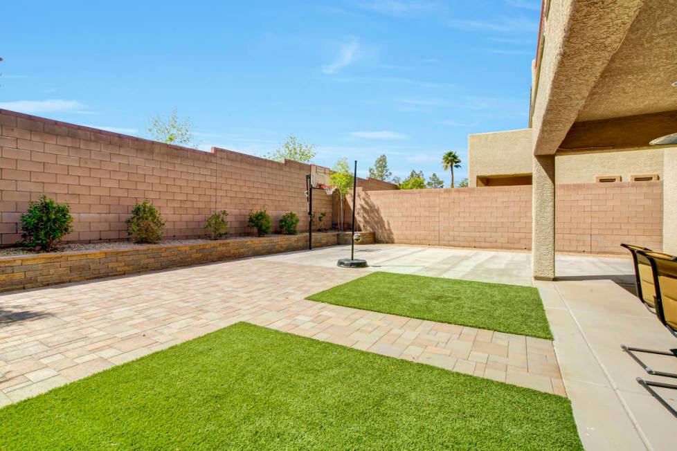 The rear yard (and basketball-ready area) of 837 Motherwell Ave. in Henderson (Casie and Derek ...