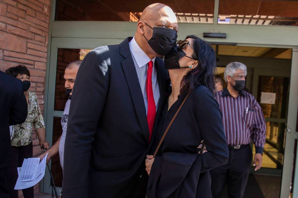 Former NBA player Jackie Robinson embraced by his wife Maria after the Clark County Commission ...