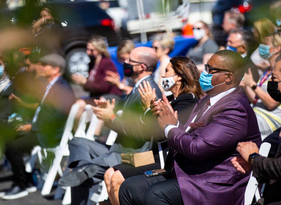 Las Vegas City Councilman Cedric Crear, right, claps during the opening ceremony for the $56 mi ...