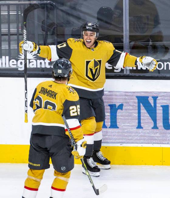 Golden Knights center Jonathan Marchessault (81) celebrates a goal with teammate center Mattias ...