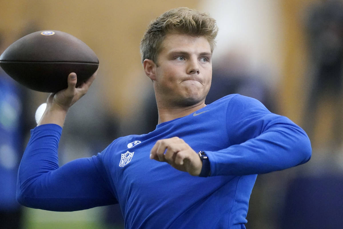 BYU quarterback Zach Wilson warms up before participating in the school's Pro Day football work ...