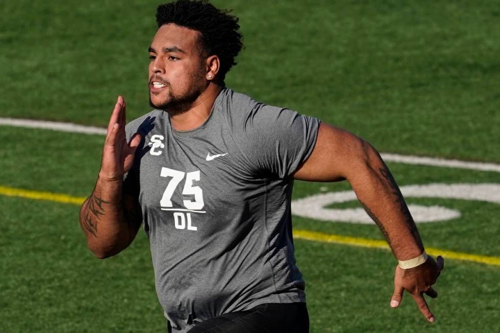 Southern California lineman Alijah Vera-Tucker participates in the school's pro day football wo ...