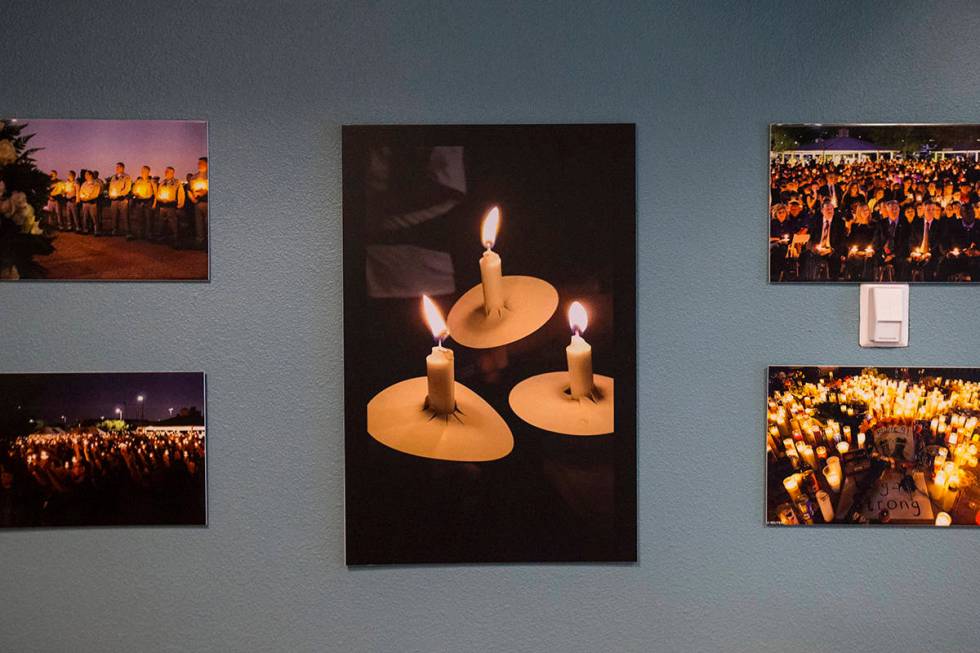 Photos of vigils and memorials following the October 1 shooting on display at the Vegas Strong ...