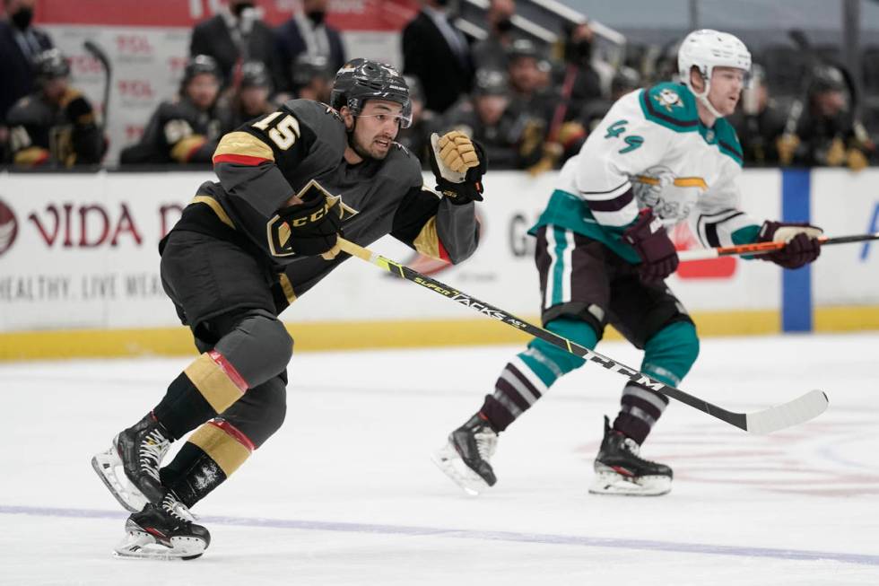 Vegas Golden Knights' Dylan Sikura, left, and Anaheim Ducks' Max Jones chase the puck during th ...