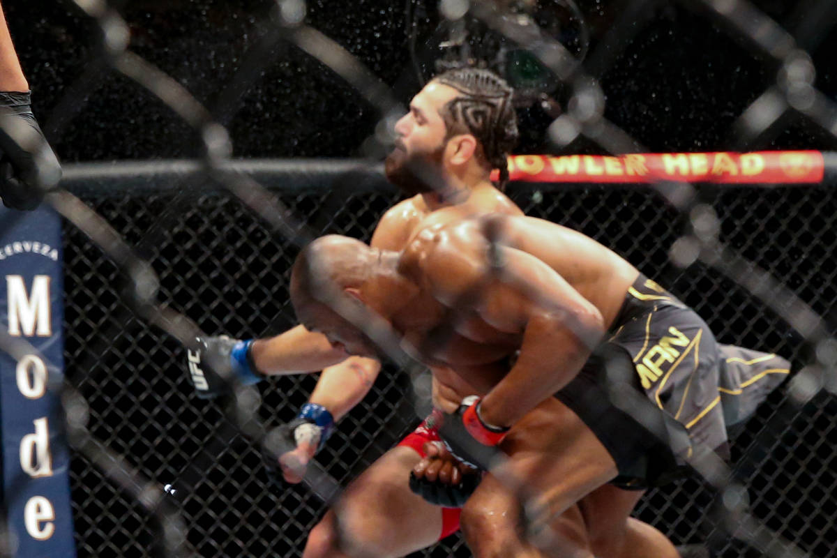 Kamaru Usman knocks out Jorge Masvidal during a UFC 261 mixed martial arts bout early Sunday, A ...