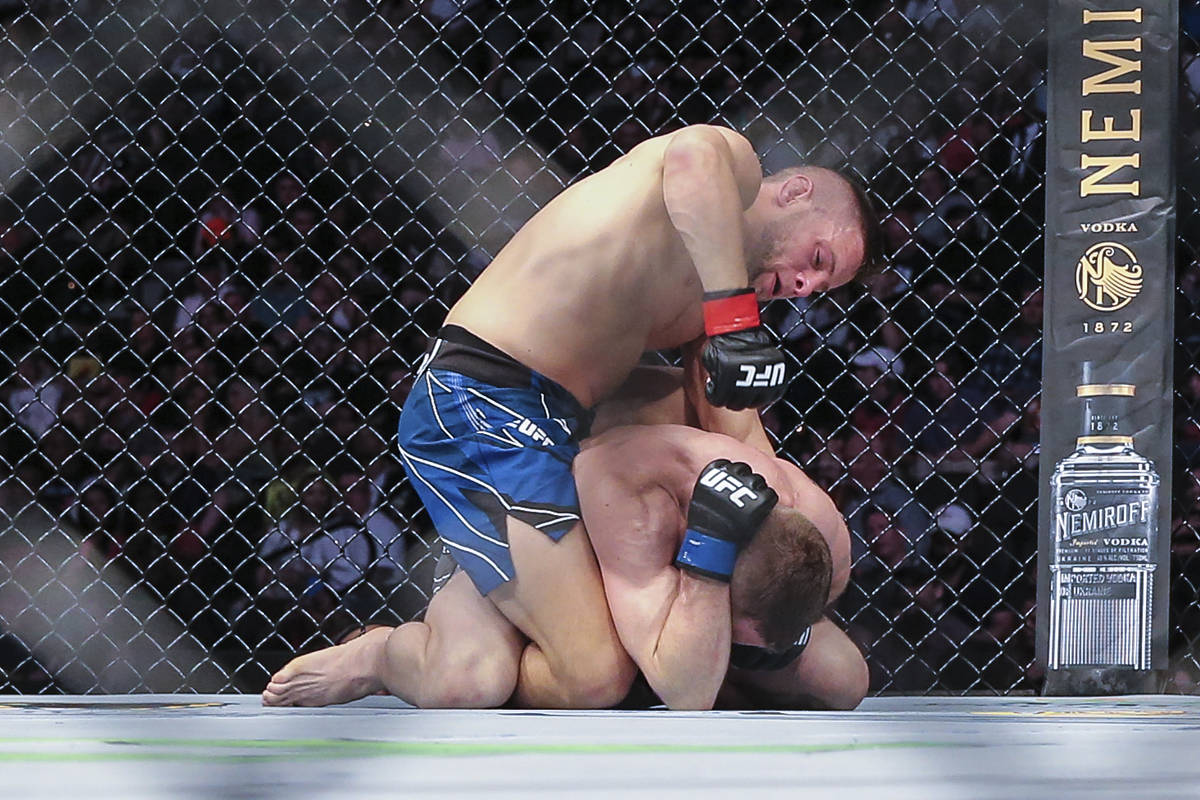 Patrick Sabatini, top, punches down on Tristan Connelly during a UFC 261 mixed martial arts bou ...