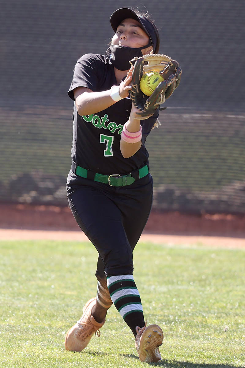 Green Valley's Cindy Martinez-Escamilla (7) makes a catch for an out in the outfield in the sev ...