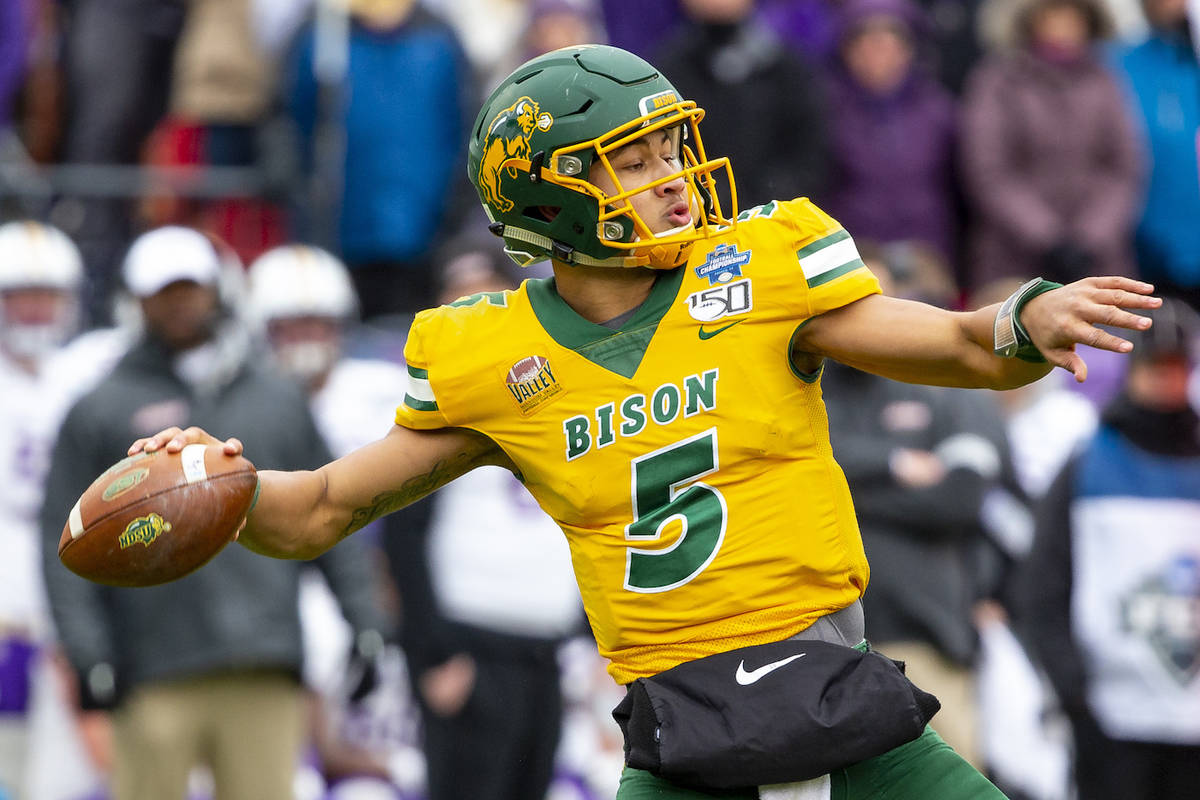 FILE - North Dakota State quarterback Trey Lance (5) winds up to throw during the first half of ...