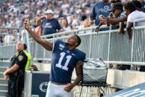 Penn State linebacker Micah Parsons (11) takes a selfie with fans in the fourth quarter of an N ...