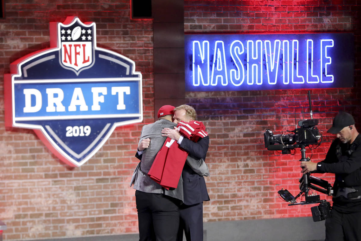 Commissioner Roger Goodell hugs Nick Bosa after Bosa was selected by the San Francisco 49ers wi ...