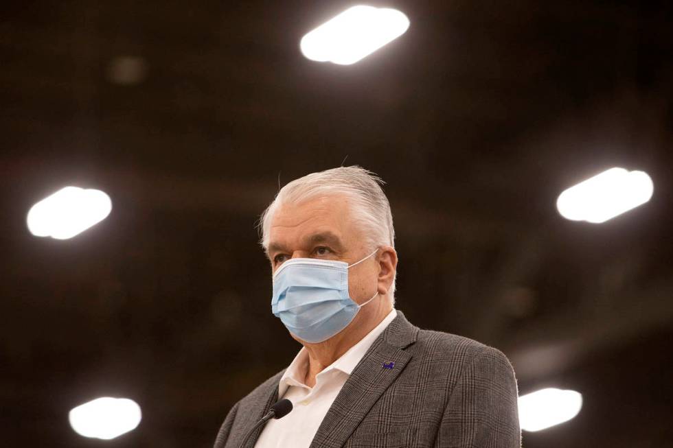Gov. Steve Sisolak gives an update to the press on Nevada's vaccination efforts ahead of the st ...