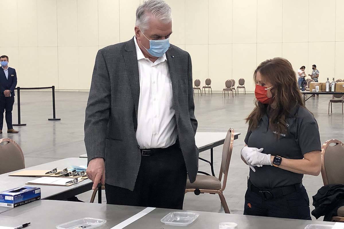 Gov. Steve Sisolak visited a vaccine clinic at Mandalay Bay in Las Vegas before his news confer ...