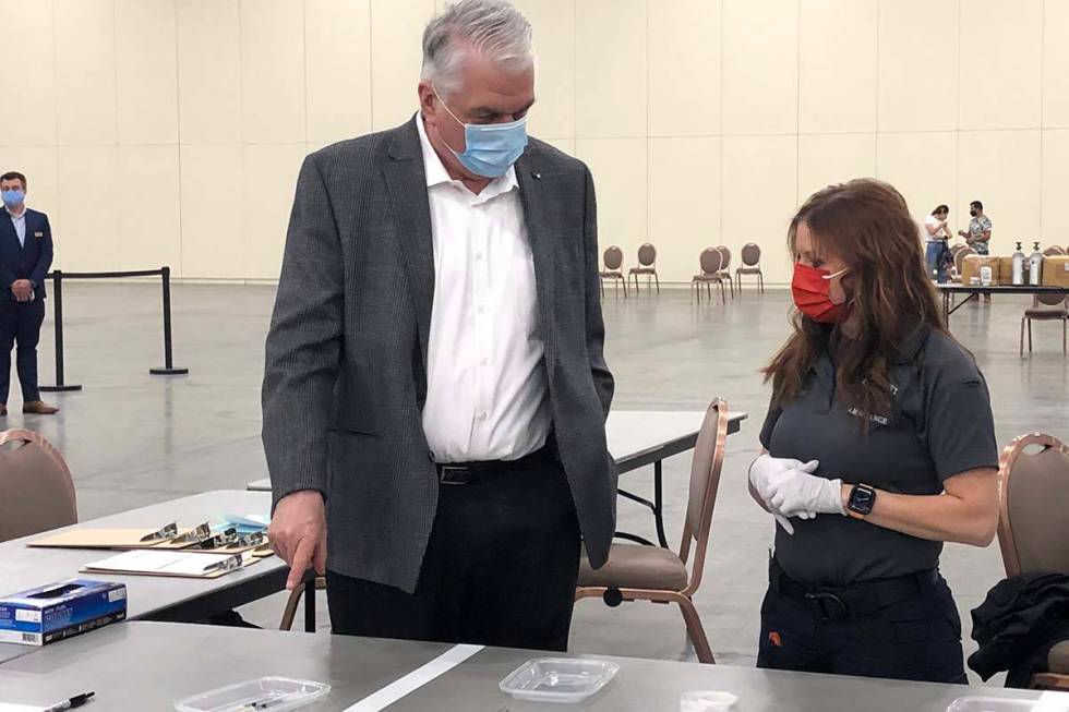 Gov. Steve Sisolak visited a vaccine clinic at Mandalay Bay in Las Vegas before his news confer ...