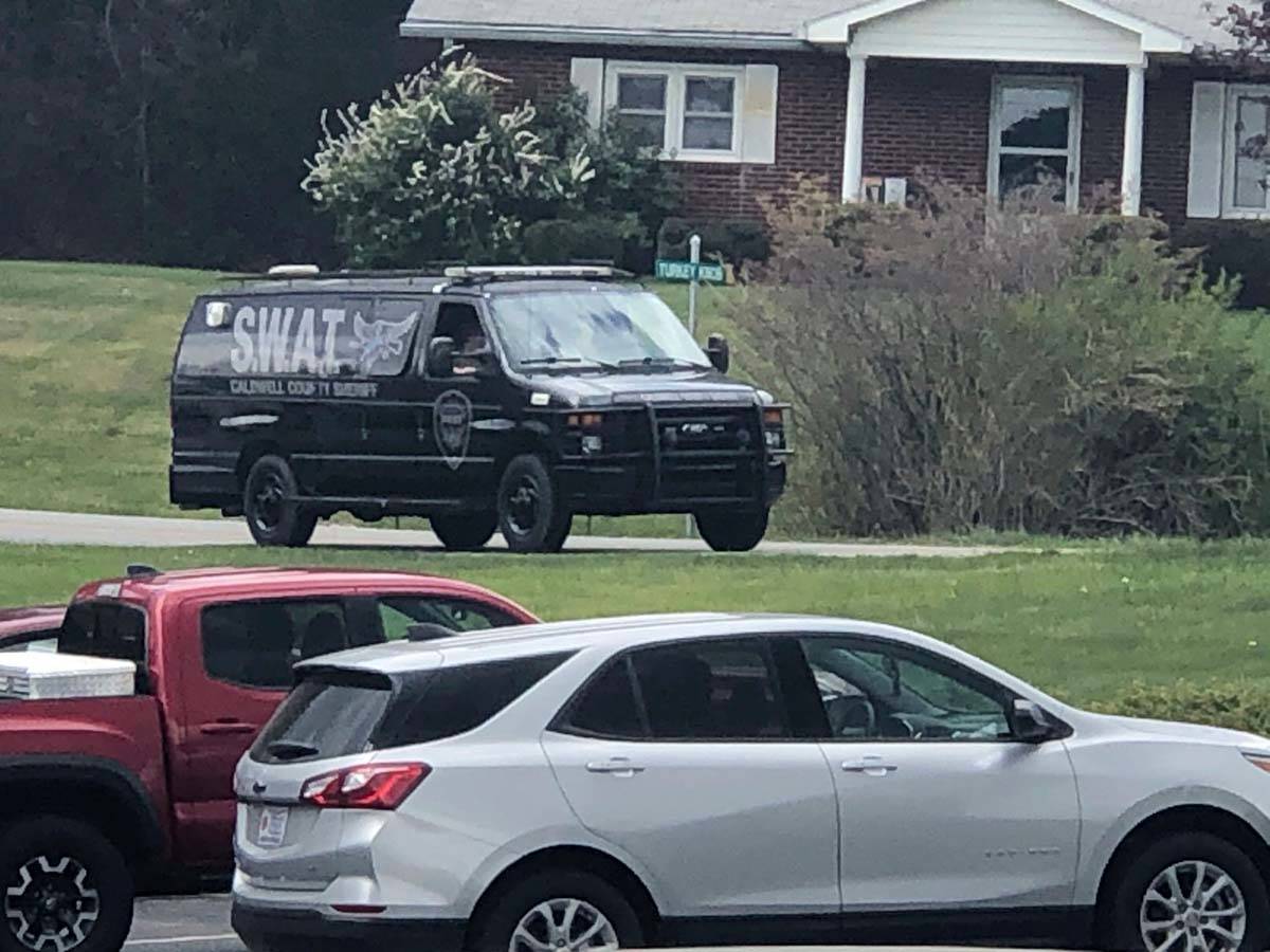 In this photo provided by WJZY, a tactical van from Caldwell County, North Carolina, sits on st ...