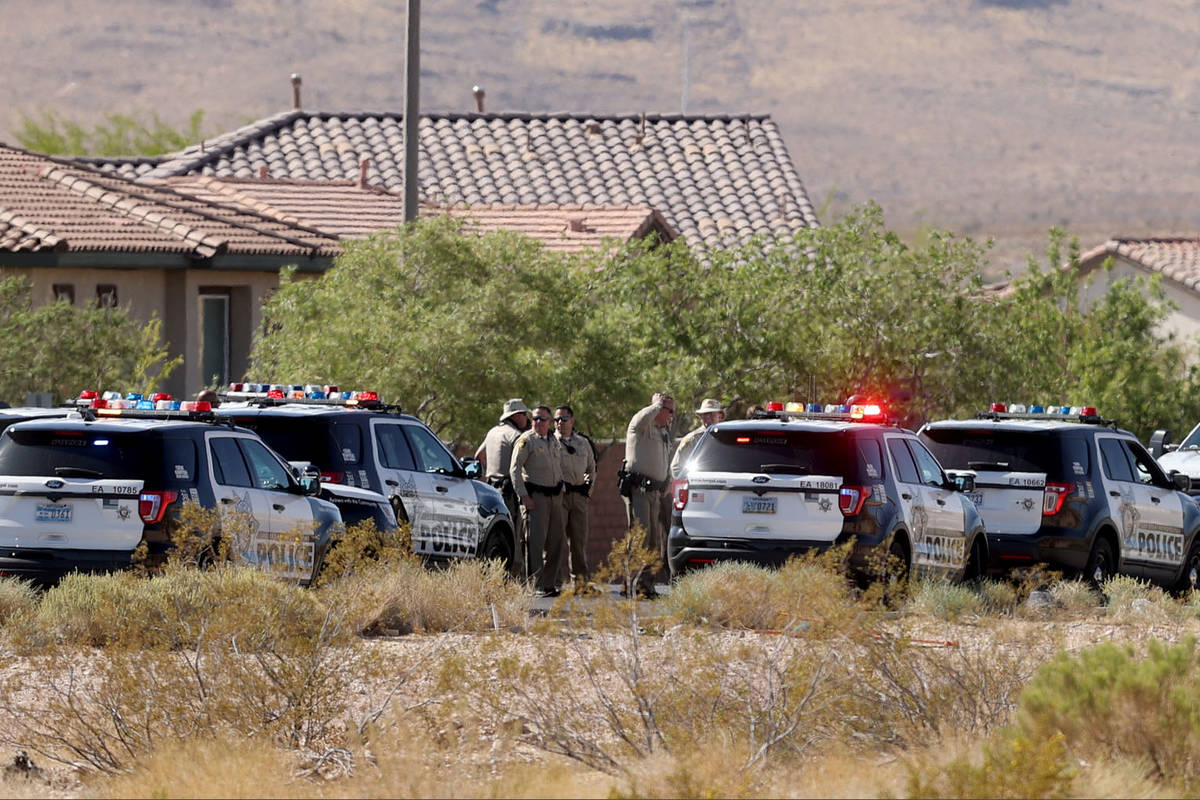 Las Vegas police investigate on Buffalo Drive near Cactus Drive after reports of a gas leak and ...