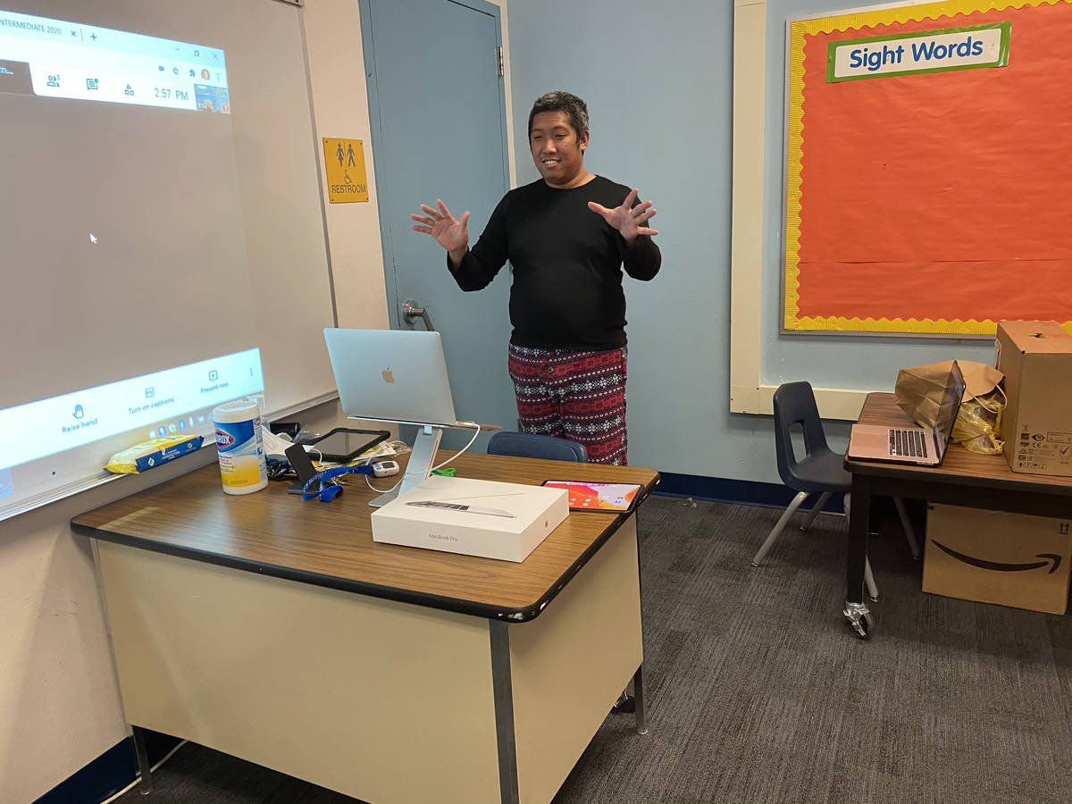 Edmon Miguel, a teacher at McWilliams Elementary School in Las Vegas, teaches his students duri ...