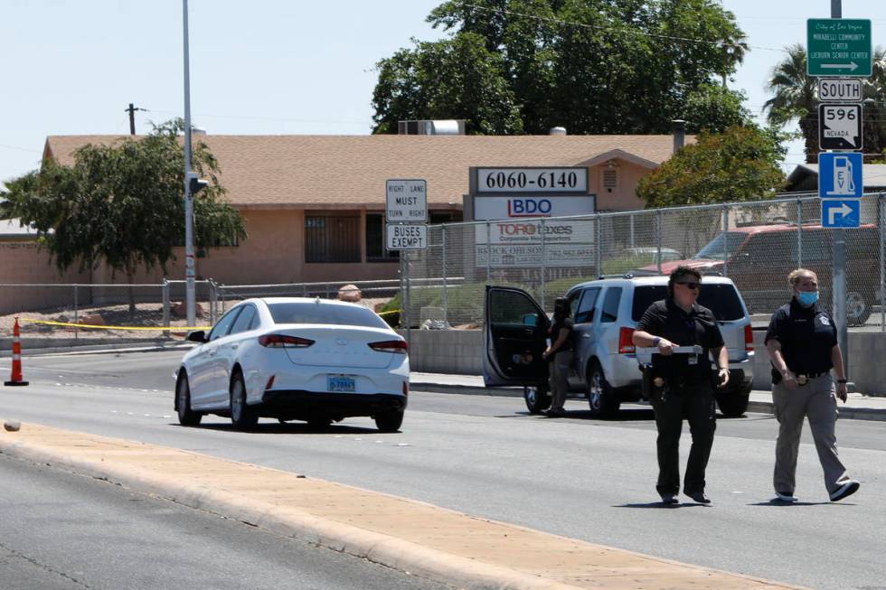 The Nevada Highway Patrol investigates at the crash scene at U.S. Highway 95 and Jones Boulevar ...