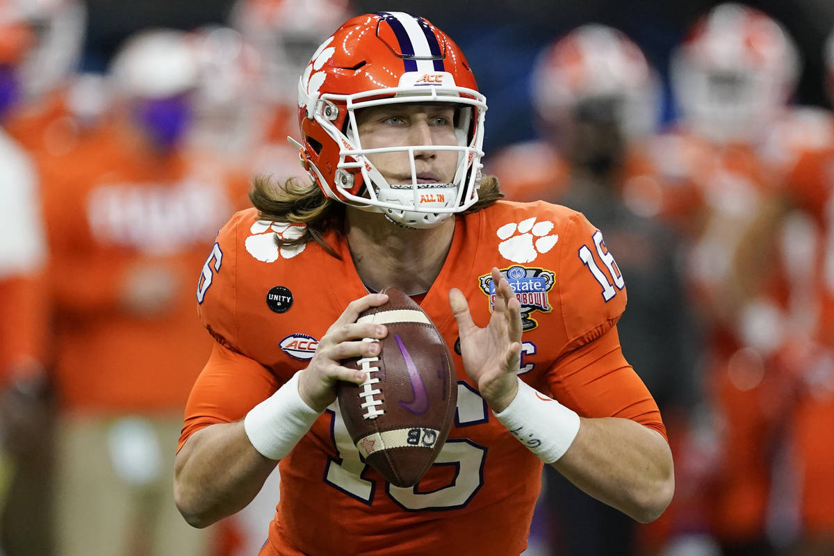 FILE - Clemson quarterback Trevor Lawrence passes against Ohio State during the first half of t ...