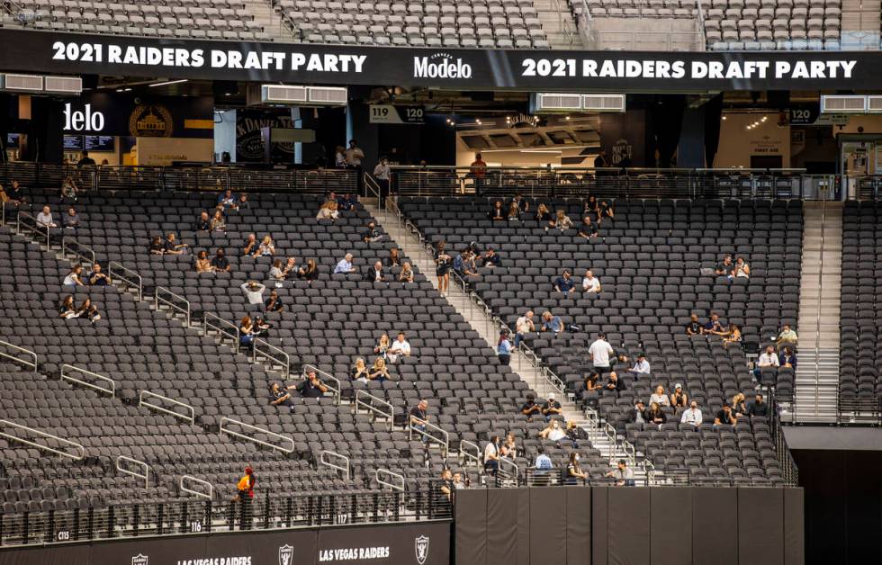 Fans are spread throughout the stands during the 2021 Las Vegas Raiders NFL Draft Party at Alle ...