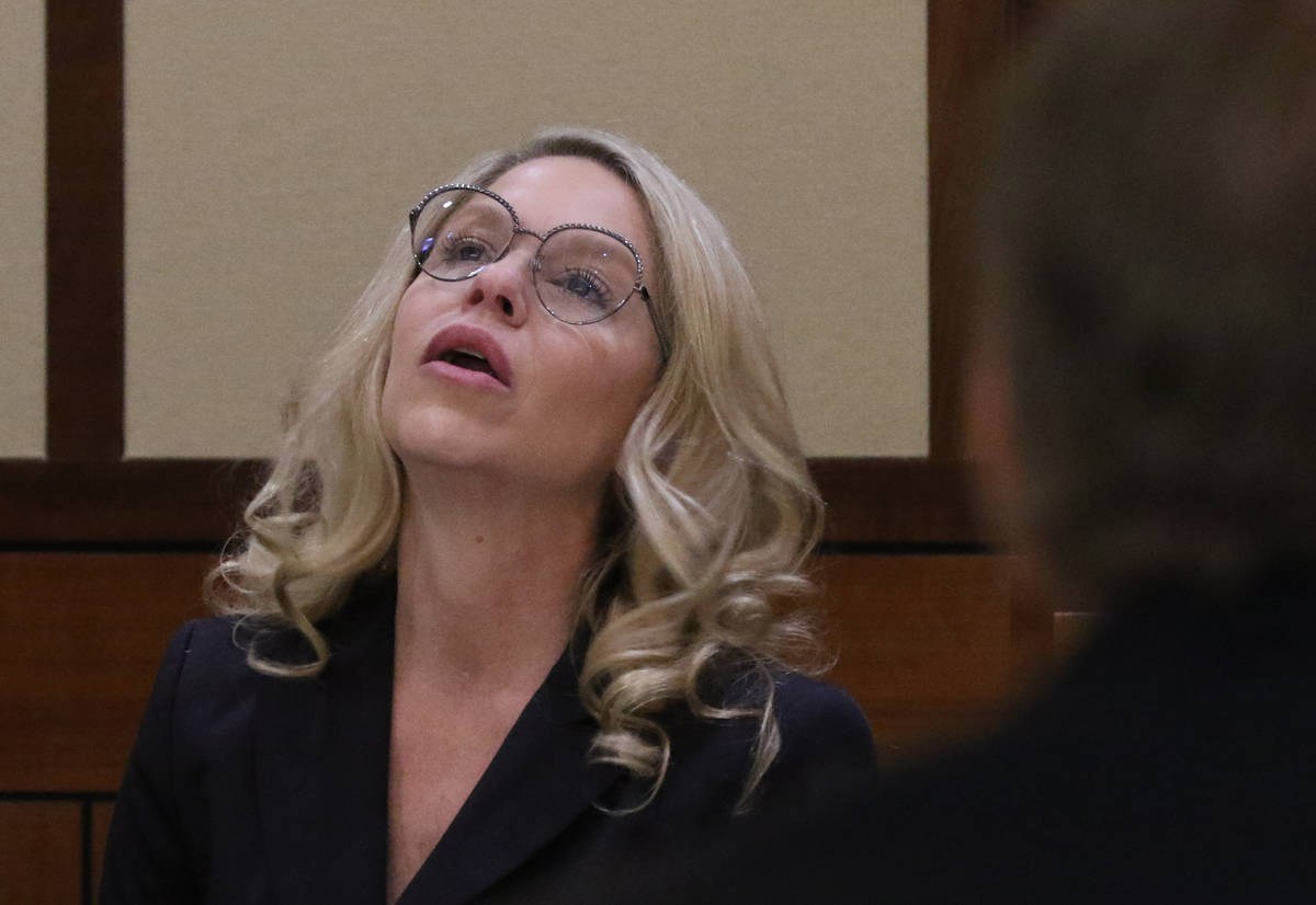 Justices of the Peace Melanie Andress-Tobiasson, left, pauses as she answers Prosecutor Thomas ...