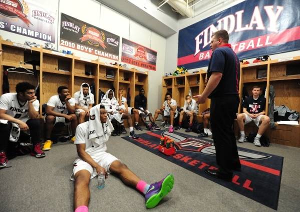 Findlay Prep coach Andy Johnson addresses his team during halftime of their game against Las Ve ...