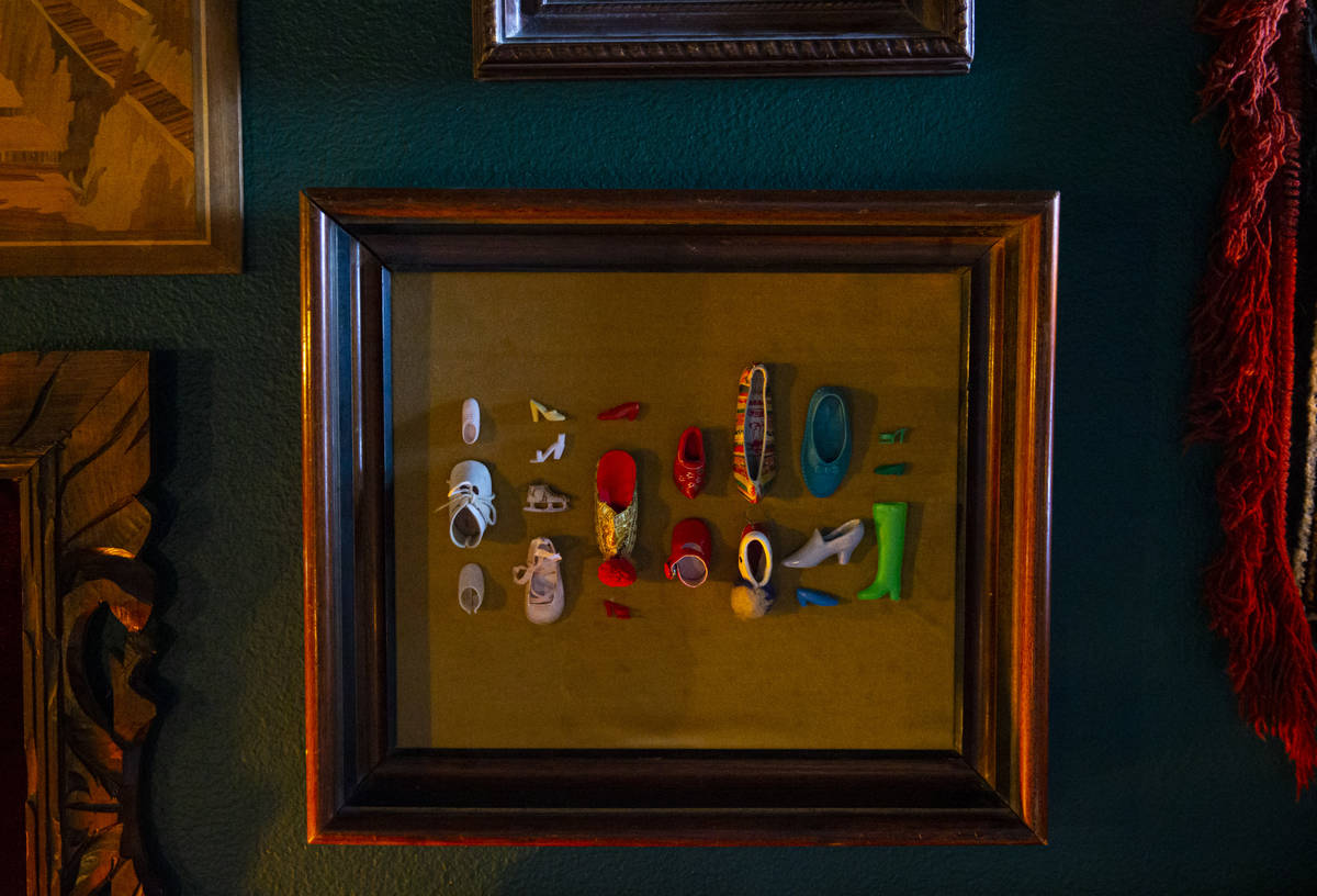 Collected miniature shoes are displayed at the Office of Collecting & Design, a museum and ...
