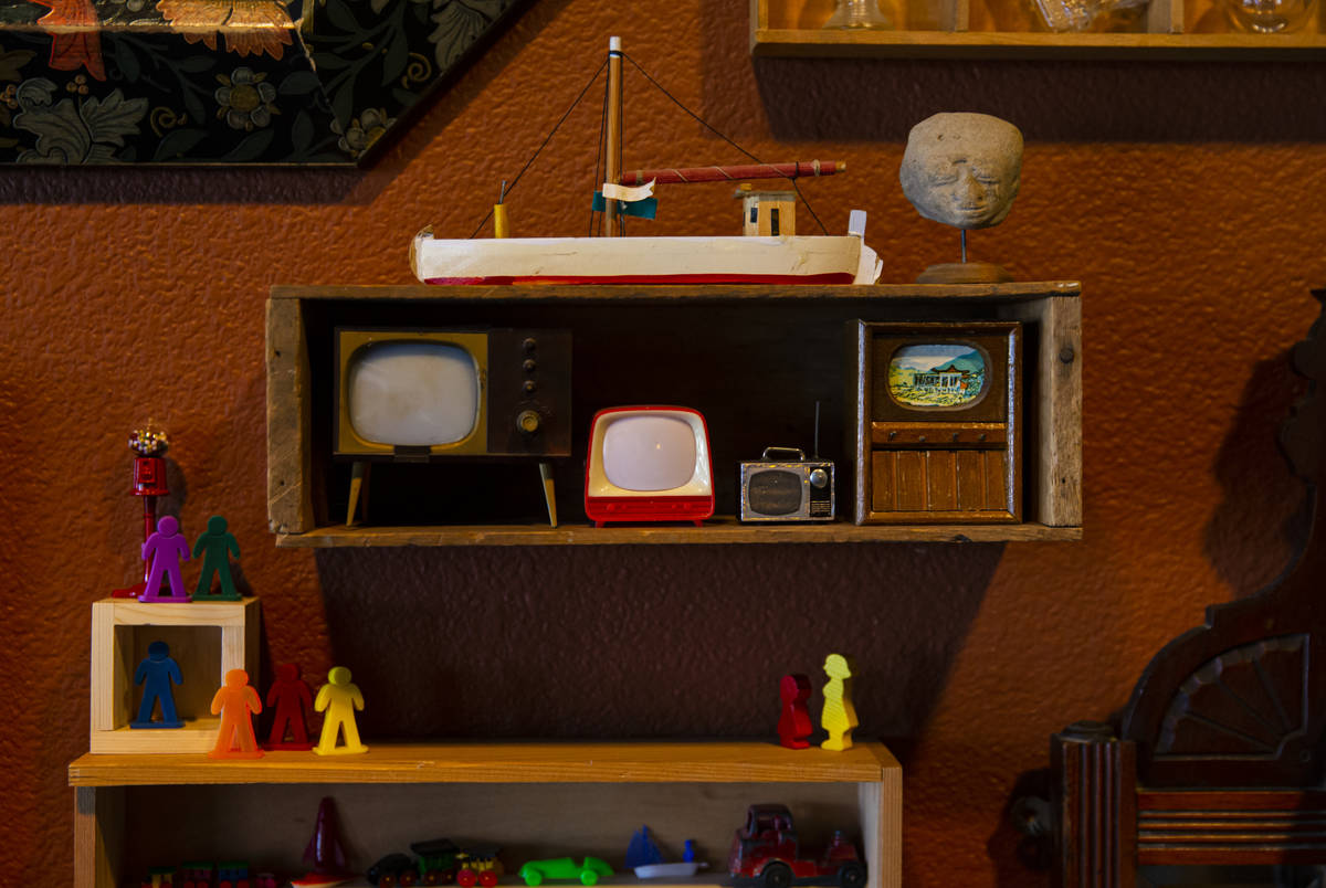 Collected miniature TVs and other items are displayed at the Office of Collecting & Design, ...