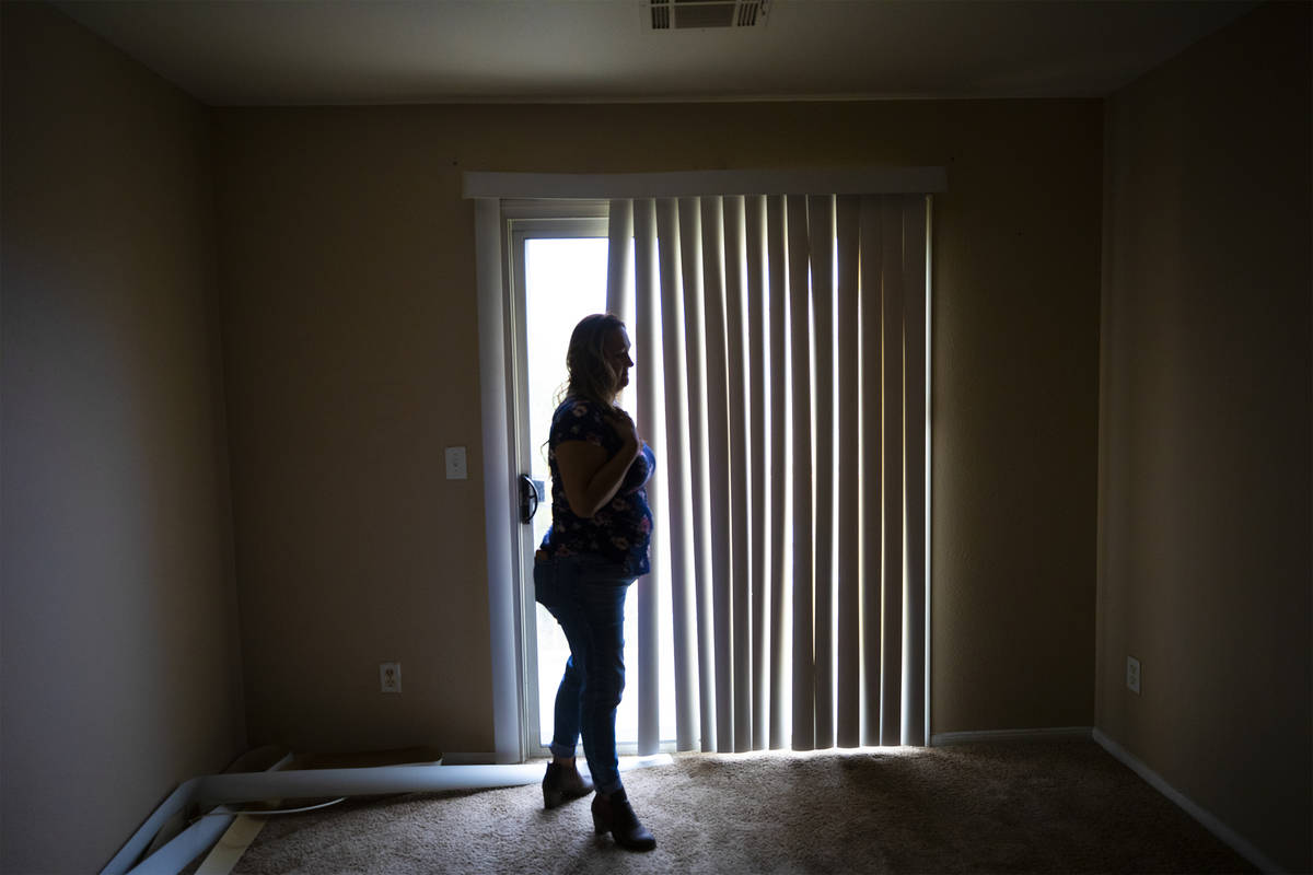 First-time homebuyer Amy Phinsee looks through a home for sale in the northeast part of Las Veg ...