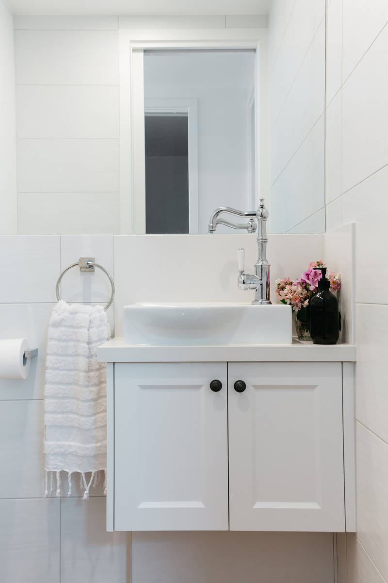 A powder room near the home's entrance provides easy hand-washing access for visitors. (Getty I ...