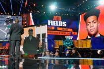 An image of Ohio State quarterback Justin Fields is displayed after he was chosen by the Chicag ...