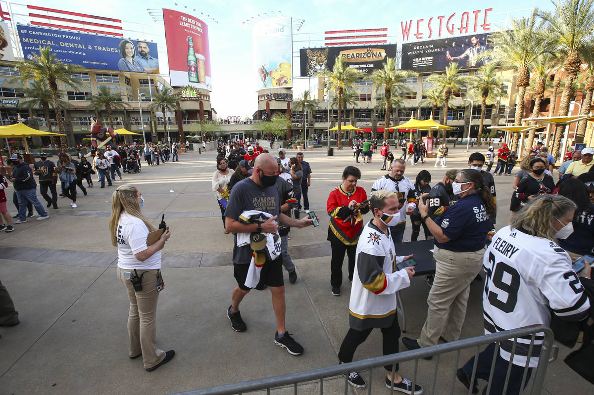 Golden Knights fans arrive for a road game against the Arizona Coyotes at Gila River Arena in G ...