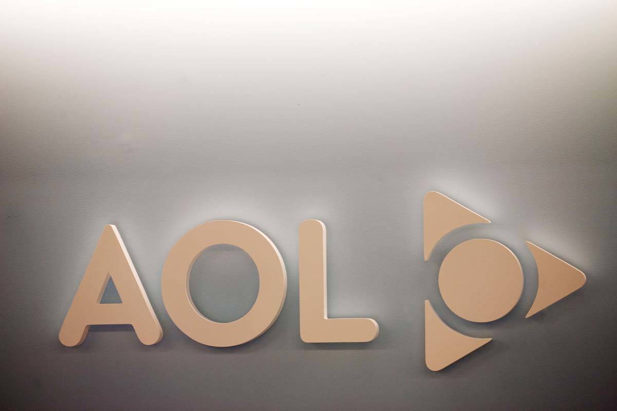The AOL logo is shown on a wall of the company's New York office, in this Monday, May 12, 2008, ...