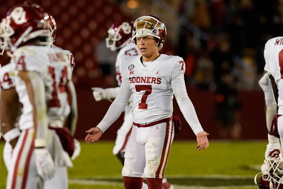 Oklahoma quarterback Spencer Rattler (7) reacts after throwing an interception during the secon ...