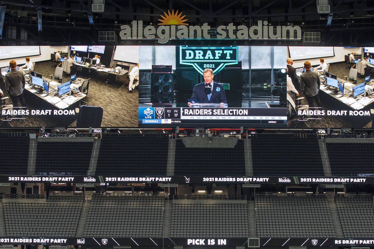 NFL Commissioner Roger Goodell announces the teamÕs first pick during the 2021 Las Vegas R ...
