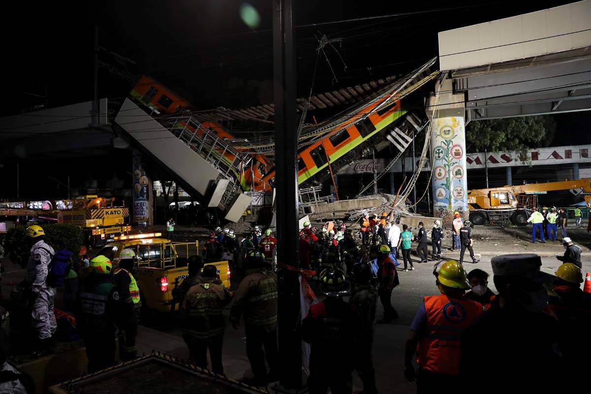 Mexico City's subway cars lay at an angle after a section of Line 12 of the subway collapsed in ...