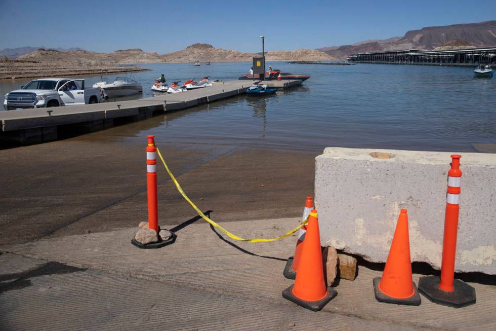 Oranges cones sit near shallow water at the Hemenway Harbor in Boulder City, Wednesday, May 5, ...