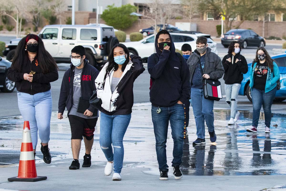 Students arrive at Liberty High School, on Monday, March 22, 2021, in Henderson. Clark County S ...