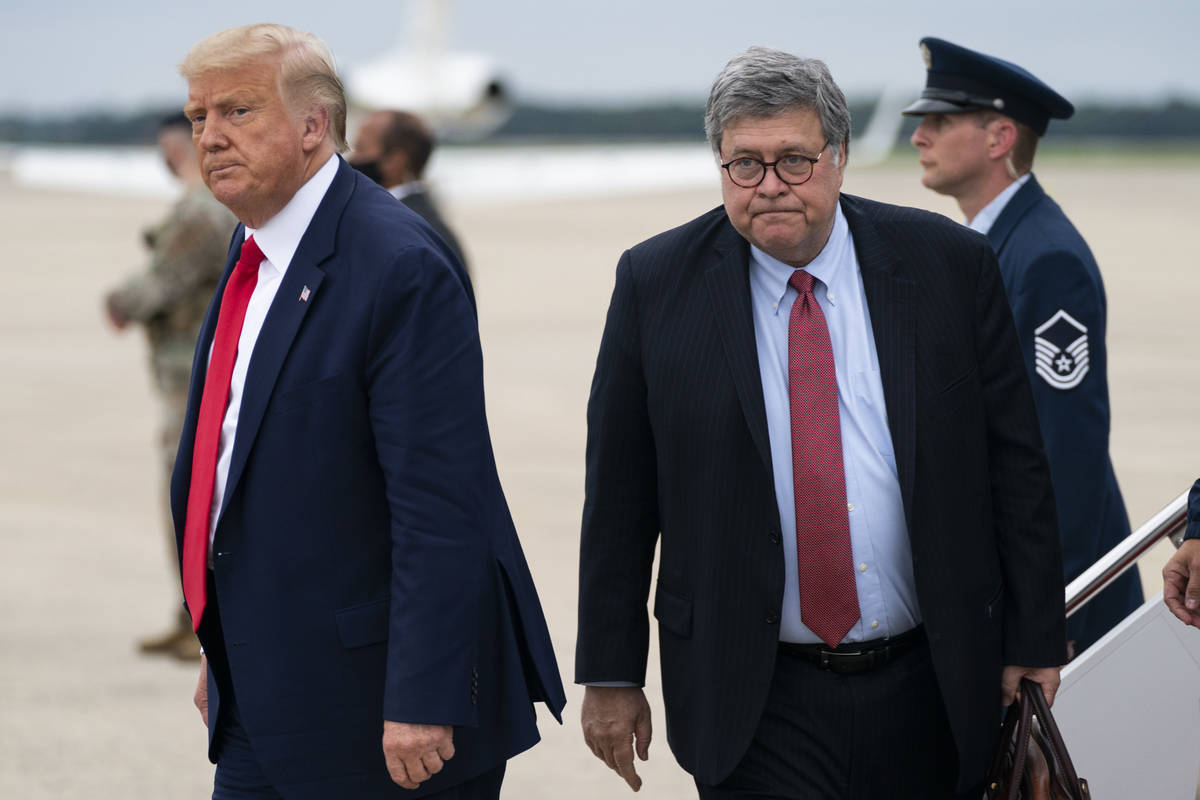 FILE--President Donald Trump and Attorney General William Barr arrive at Andrews Air Force Base ...